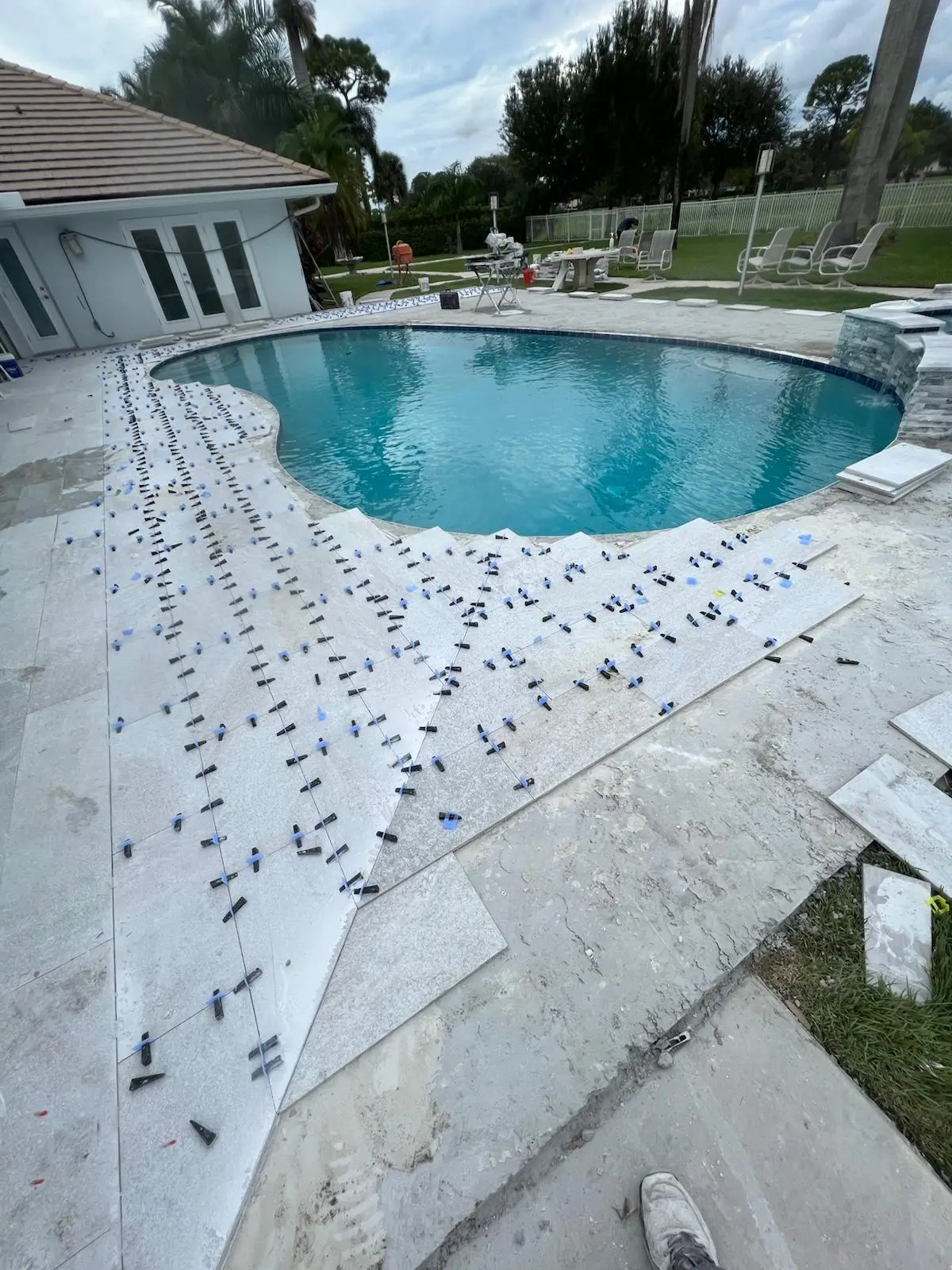Porcelain Tile Installation on Pool Deck – Boca Raton - photo 1